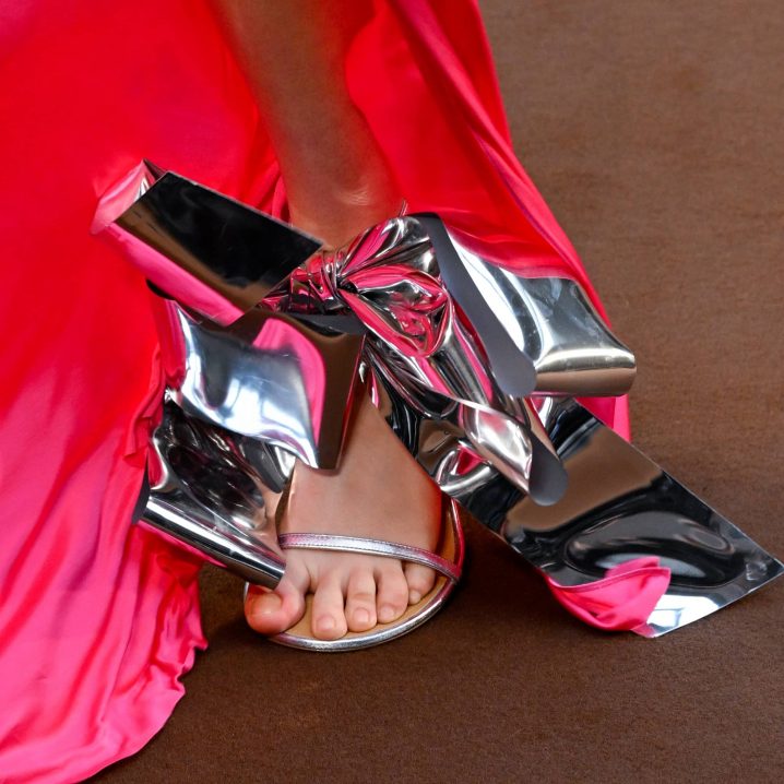 Silver heels with oversized bows at Loewe fall 2022