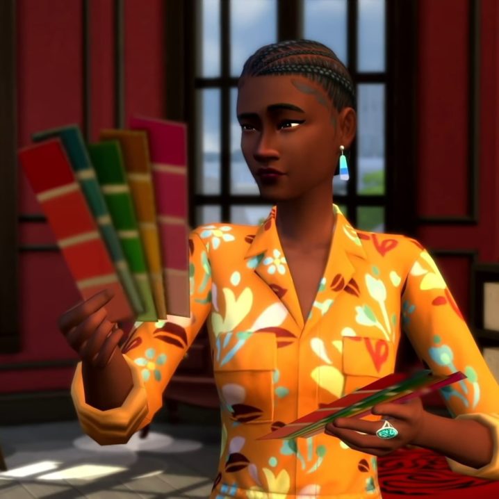 A Sim inspecting colour samples in The Sims 4 Dream Home Decorator game pack official reveal trailer.