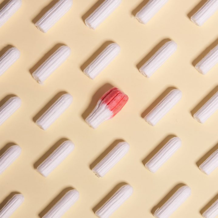 Directly Above Shot Of Tampons Against Beige Background