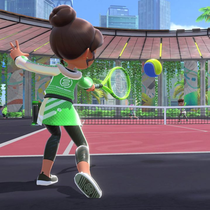 Two characters playing the tennis mini-game in Nintendo Switch Sports.