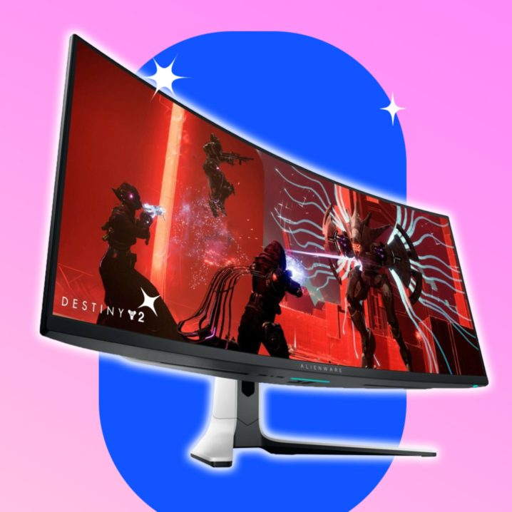 The Alienware 34 curved QD-OLED gaming monitor against a blue and pink background.