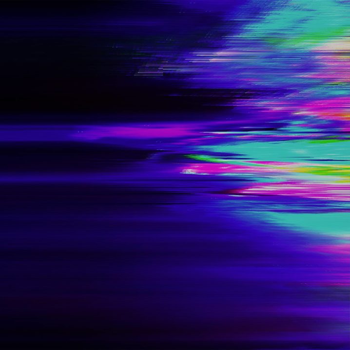 Futuristic and distorted coloured lines above a black background.