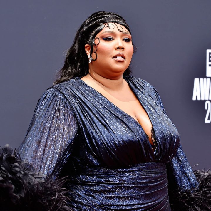 Lizzo Shows Off Her Feathered Sleeves and Thigh-High Slit at the BET ...