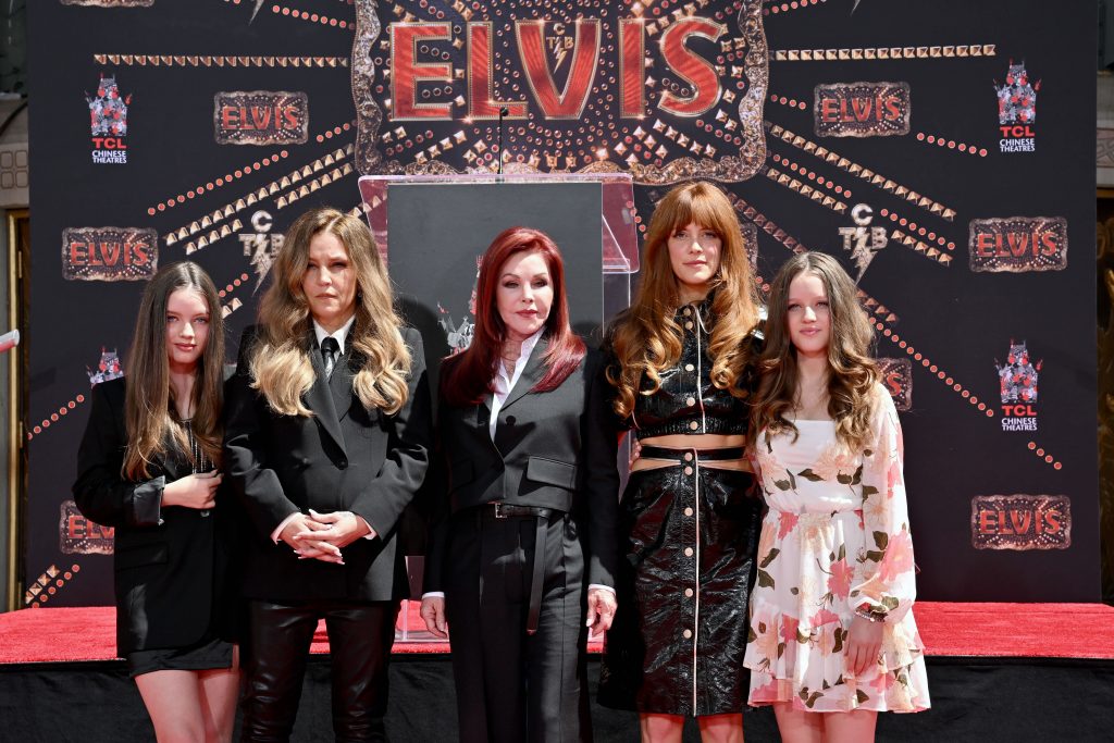 Harper Vivienne Ann Lockwood, Lisa Marie Presley, Priscilla Presley, Riley Keough, and Finley Aaron Love Lockwood attend the Handprint Ceremony honoring Three Generations of Presley's at TCL Chinese Theatre on June 21, 2022 in Hollywood, California. 