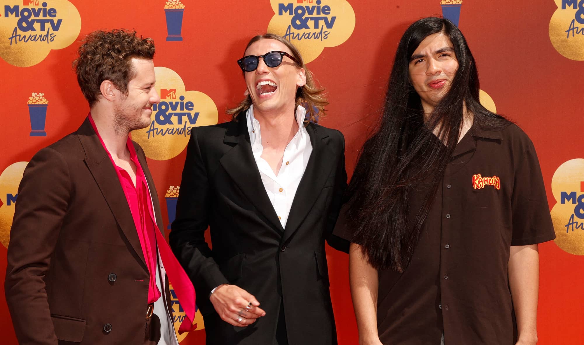 Joseph Quinn, Jamie Campbell Bower and Eduardo Franco on the red carpet at the MTV Awards