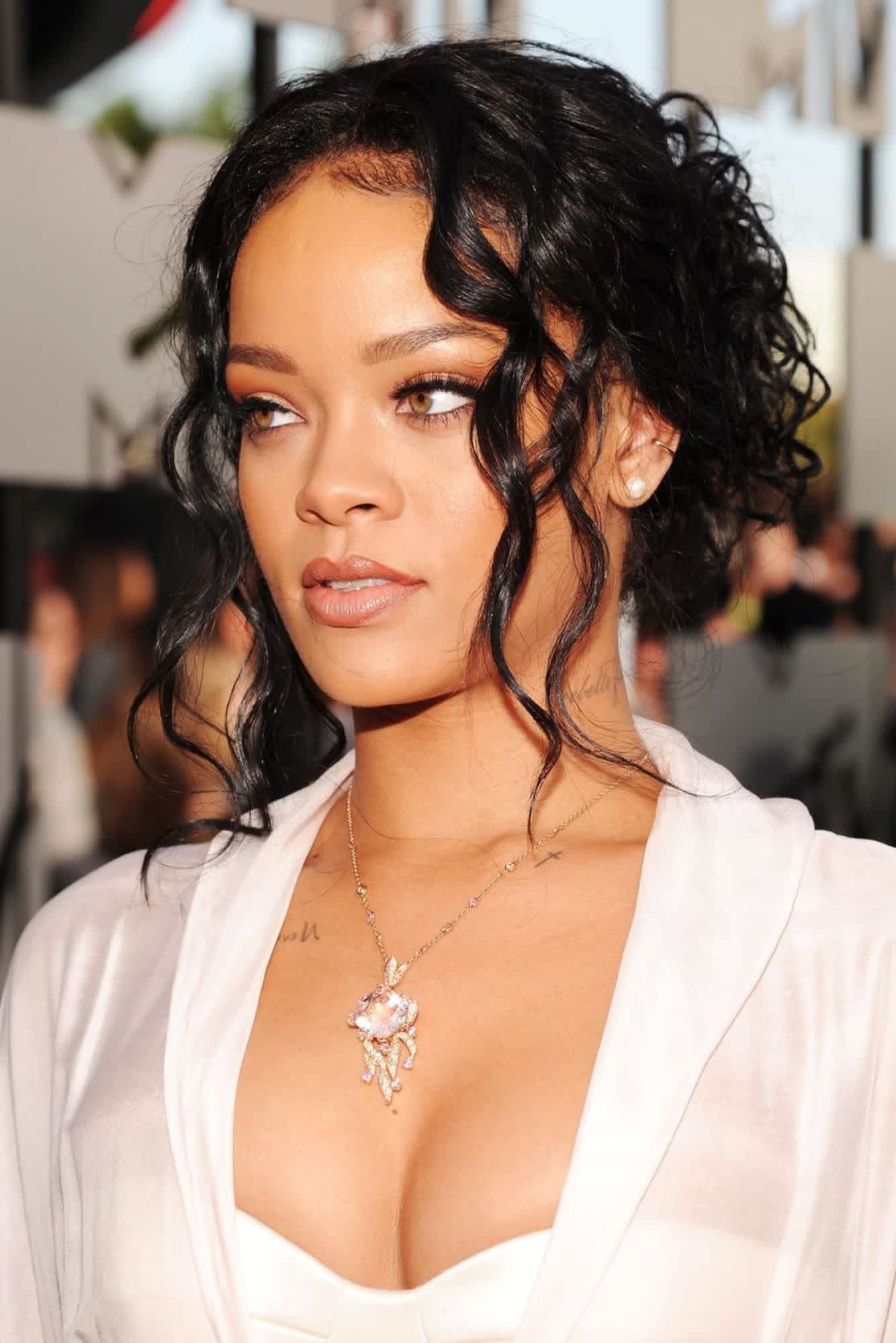 Rihanna wears the messy chignon