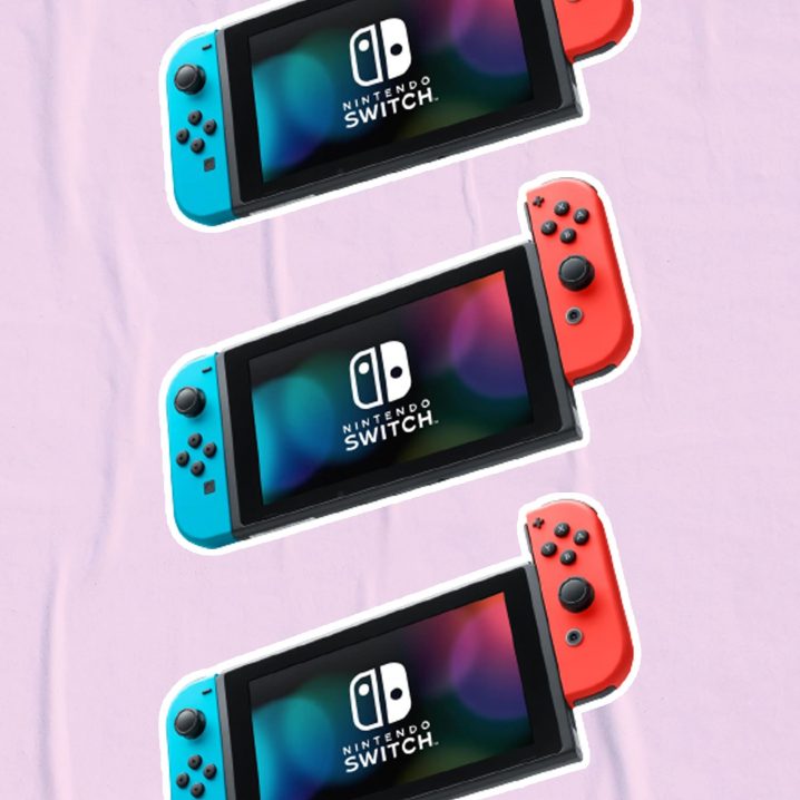 Three Nintendo Switch consoles stacked in a vertical line.
