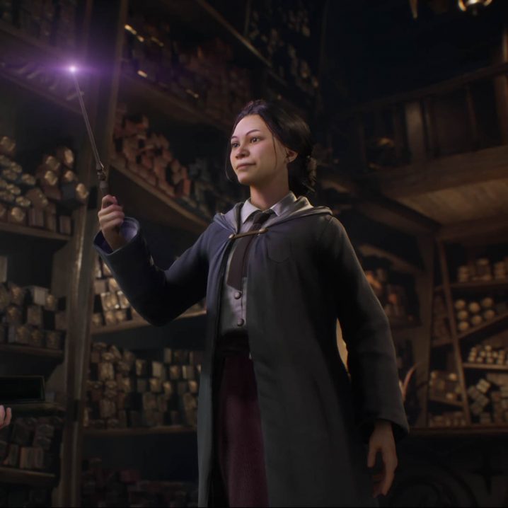 A witch choosing a wand in Hogwarts Legacy.