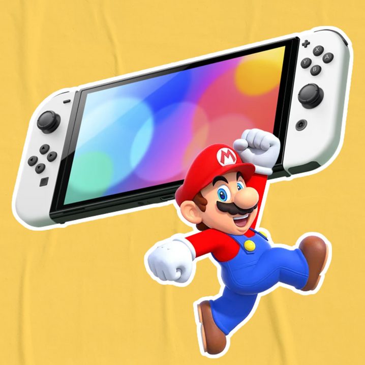 Mario cheering at the Nintendo Switch OLED.