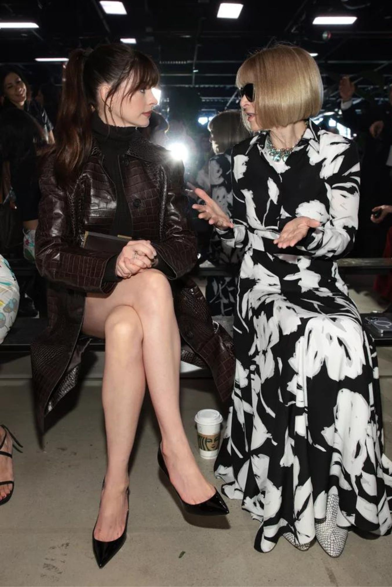 Anne Hathaway and Anna Wintour catch up at Michael Kors