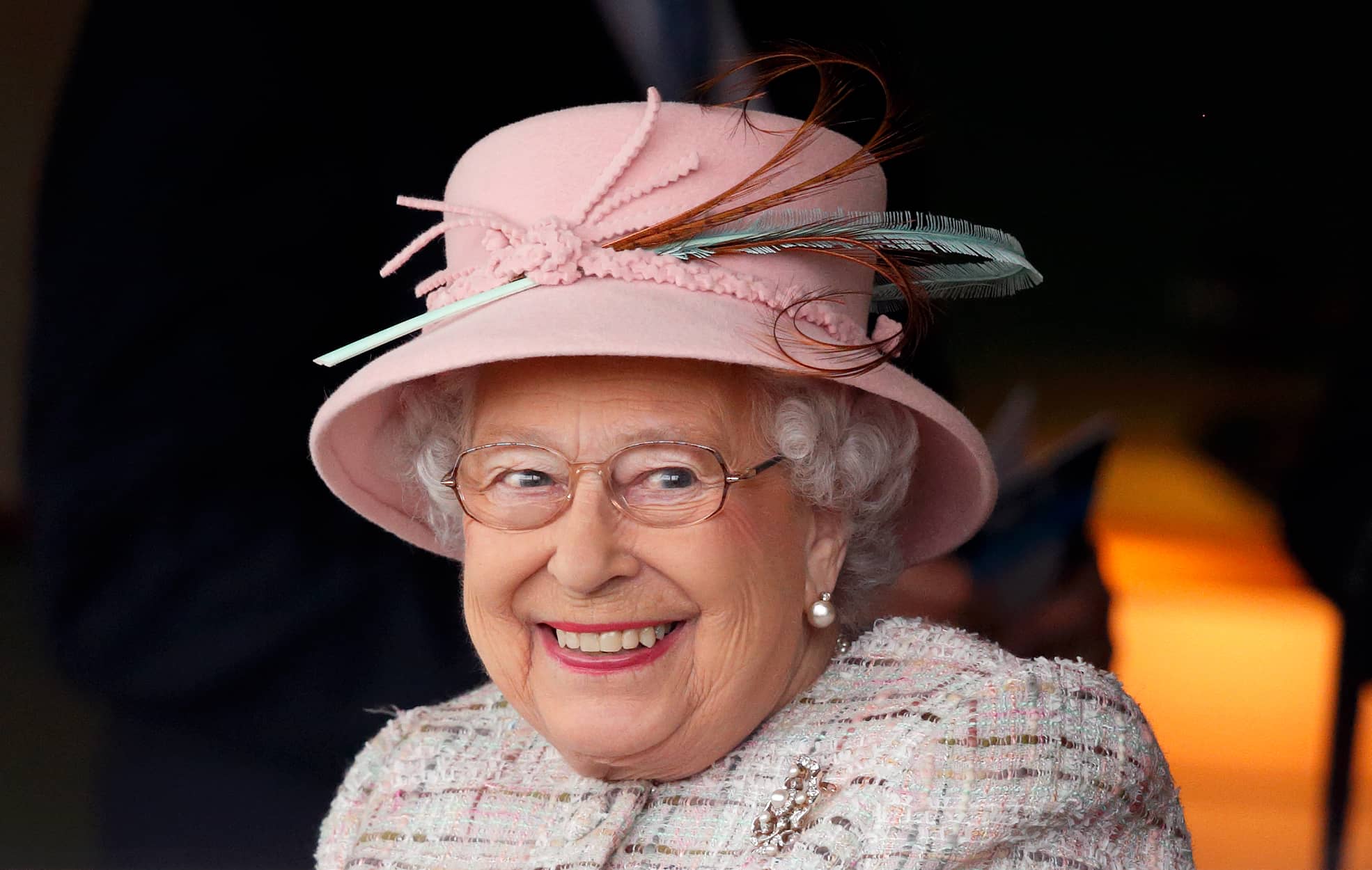 Queen Elizabeth II watches the racing as she attends the Dubai Duty Free Spring Trials Meeting