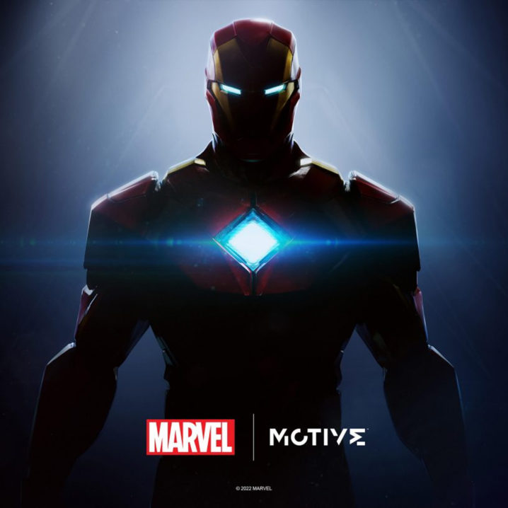 Iron Man, mostly in shadow with his Arc Reactor glowing bright blue, from EA, Marvel and Motive's announcement about the new Iron Man game.