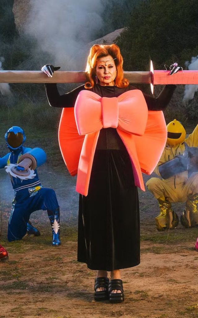 Jennifer Coolidge with red hair and superhero vibes for W Magazine 