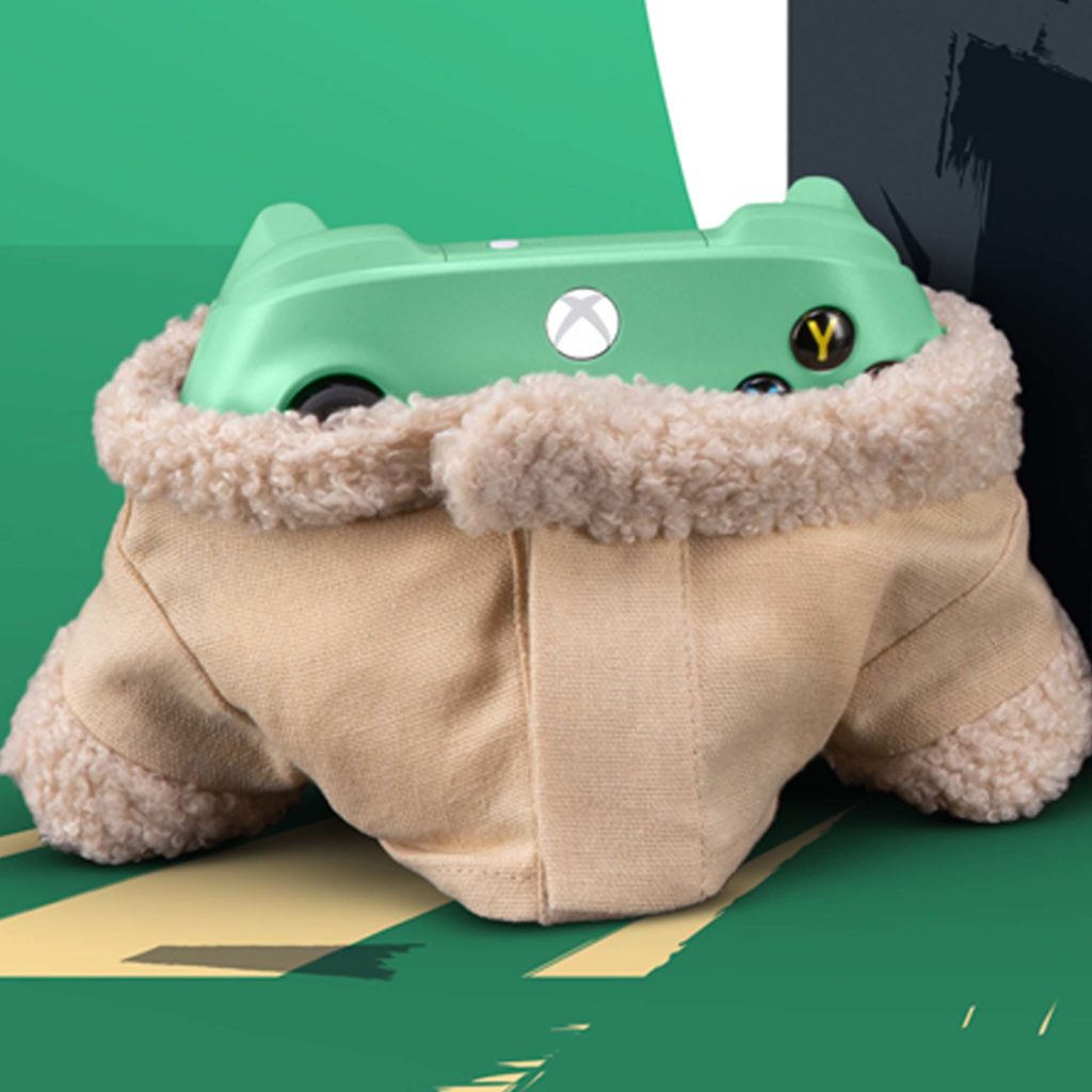 The Grogu Xbox controller wearing a matching jacket.