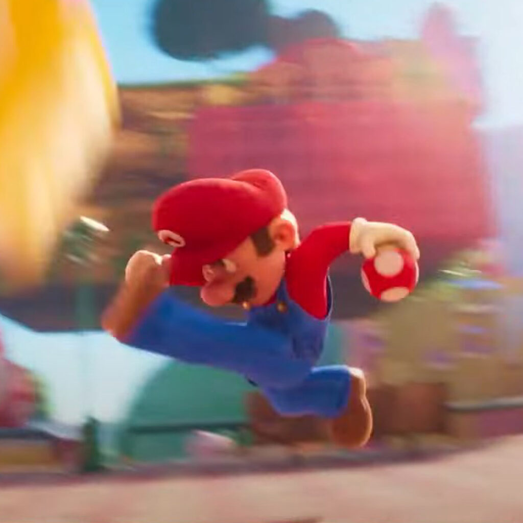 Mario kicking a gold block in "The Super Mario Bros. Movie" final trailer. His butt looks bigger than it does in the Mario's flat butt meme.