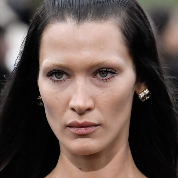 How to get rid of under eye bags explained. Pictured: Bella Hadid on the runway