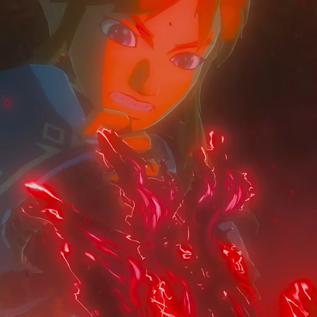 Link in the "Tears of the Kingdom" trailer. Red malice is crawling up his arm as he struggles to fight it off.