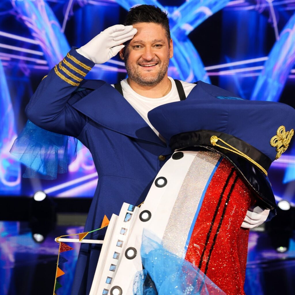 masked singer Brendan Fevola